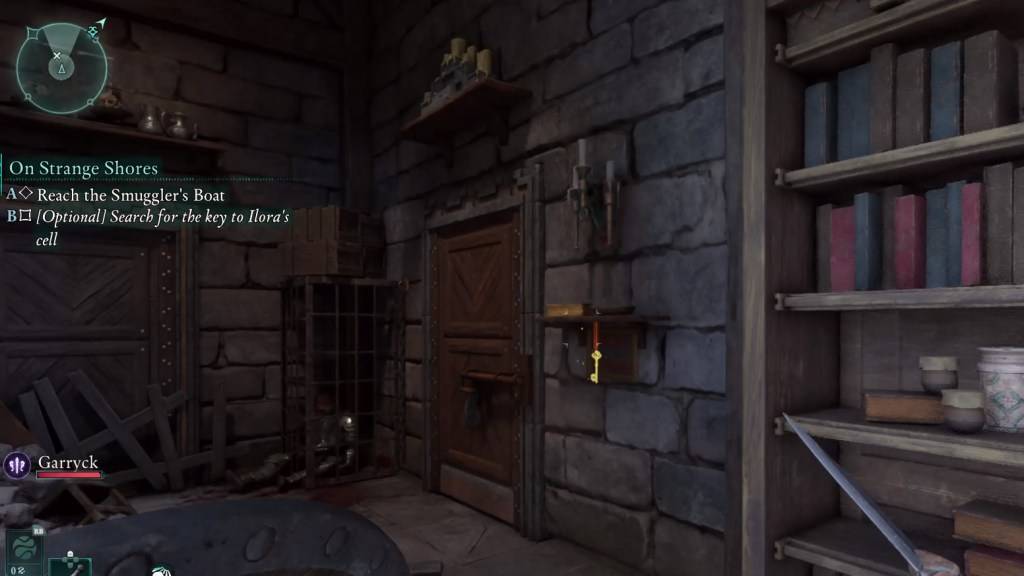 An image showing the Warden's Room in Avowed. There's a bookshelf on the right and the key to the prison cells directly in front of the player.